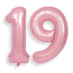 a pink balloon shaped like the number nineteen nine in front of a white background,