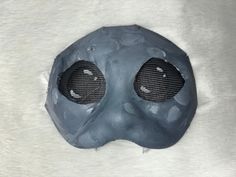 This is one of my newer masks, a leopard seal! It is a high quality mask made from a cat mask base and modified to look like a leopard seal. Mask Features: * Acrylic paint finish * High quality mesh and excellent vision * Felted Teeth * Lined with Nylon for comfortable feel Note: This product is made with a base of chipboard and paper, and therefore will mold if it gets wet and not dried properly. Please be careful not to bring this product near water! If you have any questions, feel free to reach out! Therian Ideas, Therian Gear, Therian Masks, Leopard Seal, Therian Mask, Cat Mask, Costume Mask, Paint Finish, Calico Cat