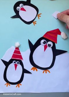 penguin craft for kids to make with construction paper and glue on the penguins are wearing party hats