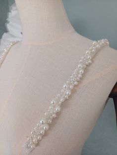 Bespoke/Made to Order Order includes: 1 Pair of Bridal Straps. They need to be sewed/pinned on the inside of your dress. Please check on the YouTube link below to see how and where to pin/measure the straps. https://youtu.be/2V_z7fmXQWc * All photos are unedited; what you see is what you get. DELIVERY The standard delivery service we use for the UK is Royal Mail 2nd class service which normally takes 2-3 working days and no tracking number is available. Royal Mail international standard service Pearl Bridal Belt, Bridal Straps, Pearl Straps, Bridal Belts, Wedding Veil Accessories, Bridal Separates, Pearl Dress, Pearl Bridal, Bridal Belt