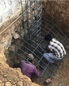 two men are working on the construction site