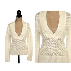 This creamy, off white pullover sweater top is a soft wool, mohair blend and is from Ann Taylor Loft. The sweater is done in a lacy pointelle knit and has a plunge v-neck which makes it great for layering. There is a subtle sparkly gold thread that adds shimmery highlights.   MEASUREMENTS: Across shoulder - 15.5 inches Sleeve length - 27 inches (uncuffed) Armpit to armpit - 16.75 inches Bust fits up to - 33.5 inches Waist - 28 inches Length - 25.5 inches Modern size: XS/Small Label marked size: Winter Clothes Women, White Pullover Sweater, Velvet Kimono, Pointelle Sweater, Mohair Wool, Clothes Women, Hippie Outfits, Pullover Sweater Women, Vintage 2000s