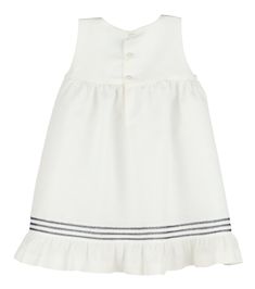 Lovely white sailor dress with navy blue stripes, buttons, and bow accent. Square neckline with ruffle at hem. Perfect for summer holidays, including Memorial Day and Fourth of July! Matching brother bubble and big sister dress available. Also available. in red. Preppy White Ruffled Dress, Preppy Sleeveless Summer Dress, White Nautical Dress For Spring, Preppy Striped Cotton Dress, Navy Sleeveless Dress With Ruffles, White Summer Dress With Striped Hem, White Sleeveless Nautical Dress, Spring Nautical Cotton Dress, White Sailor Dresses For Spring