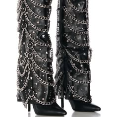 Strut Like The Whole World Is Your Runway In The Azalea Wang "Rockstar Rebel" Black Embellished Hardware Fold Over Boot. Crafted Using A Luxurious Faux Leather Upper, This Bad-To-The-Bone Style Features A Knee-High Fold Over Shaft, A Pointed Toe Silhouette, Tonal Stitching, A Slightly Covered Slim Stiletto Heel, A Comfortable Cushioned Insole, Faux Silver Metallic Hardware, A Pull-On Fit, And An Inner Ankle Zipper Closure. Complete With An Ultra-Decorated Body, Consisting Of Pointed Pyramid And Rockstar Accessories, Rockstar Boots, Concert Shoes, Rockstar Pants, Diy Boots, Cover Boots, Rockstar Fashion, Crazy Heels, Odd Fashion