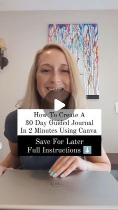 a woman sitting at a table with a laptop in front of her and the words how to create a 30 - day guided journal