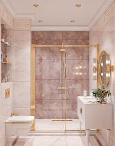 an elegant bathroom with gold accents and marble walls