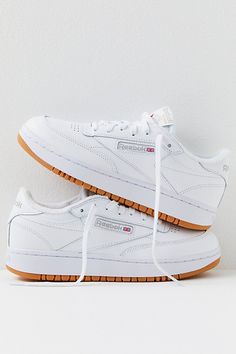 A tennis-inspired design with a modern update, these simple, chunky sneakers from Reebok features a heritage leather upper design sat on a subtle platform midsole for a little lift. **Features:** Low-top style, leather uppers, perforated toe box, overlay details, platform rubber cupsole, terry lining, lace-up closure **Why We | Reebok Club C Double Sneakers at Free People in White, Size: US 9 Trendy Platform Shoes, Club C Double Reebok Outfit, Club C Double Reebok, Reebok Sneakers Outfit, Reebok Club C Double Sneaker, Reebok Outfit, Reebok Club C Double, Red Reebok, White Platform Shoes