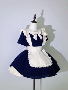 This price includes a dress and a beige bowknot.  Get ready to channel your inner maid with this stunning Dark Blue Lolita Fashion Apron Dress. Complete with a charming bowknot on the neckline, this dress is perfect for anyone looking to add a touch of elegance and whimsy to their wardrobe. Whether you're attending a tea party or simply want to showcase your love for Lolita fashion, this apron dress is sure to turn heads and make you feel like a true fashionista.   	 		 			Size 			S 			M 			L Short Sleeve Cotton Dress With Bow, Pirate Dress, Fashion Apron, Gothic Skirts, Maid Outfit, Maid Dress, Apron Dress, Outfits With Hats, Lolita Dress