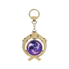 a purple and gold keychain with an emblem on it