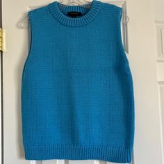 Brand New Ann Taylor Sleeveless Sweater. Light Blue Sleeveless Spring Vest, Casual Blue Sweater Vest For Spring, Blue Cotton Sweater Vest For Fall, Blue Cotton Vest For Fall, Sleeveless Cotton Sweater Vest, Blue Cotton Vest For Spring, Cotton Sleeveless Sweater Vest, Blue Tank Vest For Spring, Blue Sleeveless Spring Vest