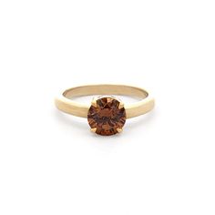 Whiskey: Cognac Diamond Solitaire Ring Lingering with smoky, malty flavour...The dark, amber colour of this cognac diamond is the reminiscent of a fine, barrell-aged whiskey. Featuring a 1.02 ct brilliant cut cognac diamond, the 18ct yellow gold perfectly complement this stunning coloured diamond. This particular piece is currently in stock and can be ready to ship within 1-3 days, after resizing to suit your ring size if necessary. If you would like this style custom crafted to your specificati Luxury Brown Jewelry With Brilliant Cut, Modern Brown Jewelry For Anniversary, Luxury Brown Formal Rings, Classic Brown Jewelry For Formal Events, Classic Brown Jewelry For Formal Occasions, Classic Brown Rings With Polished Finish, Brown Round Diamond Ring In Fine Jewelry Style, Formal Brown Rings With Polished Finish, Brown Diamond Ring In Fine Jewelry Style