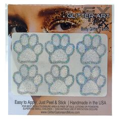 the glitter art stickers are designed to look like paw prints on a woman's face