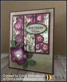 a birthday card with purple flowers on it