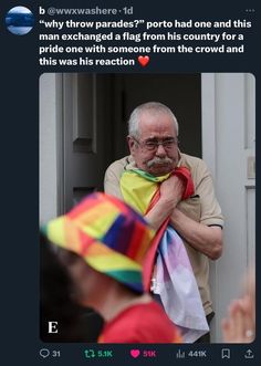 an old man with a rainbow colored hat on his head