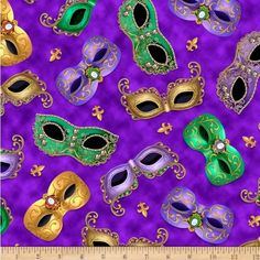 a purple background with many different colored masks