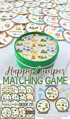 the happy camper matching game is on display in front of a table with plates and cupcakes