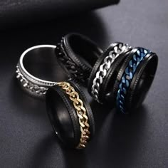 Description: Discover a world of calming elegance with our Colorful Rotatable Chain Fidget Rings for Men. Crafted from high-quality titanium stainless steel, these spinner rings are more than just jewelry – they're a perfect solution for anxiety relief. The colorful rotatable chain design adds a playful touch while providing a discreet outlet for fidgeting. Ideal for men seeking both style and relaxation, these rings make the perfect gift for those navigating the challenges of anxiety. Elevate your accessory game with these functional and stylish Fidget Rings that offer a perfect blend of fashion and mindfulness. Shop now and embrace serenity with our Colorful Rotatable Chain Fidget Rings for Men. If you would like a different size, please choose your size from the links below: Size 6 Size Punk Women, Gold Color Ring, Stacking Ring Set, Fidget Rings, Purple Necklace, Vintage Type, Ring Color, Spinner Rings, Silver Pieces