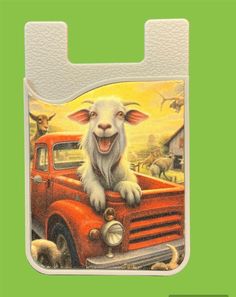 an orange truck with a goat on the front