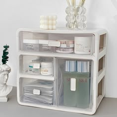 a white shelf filled with lots of different items