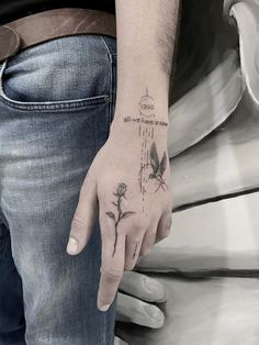 a person with a tattoo on their hand