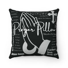 a black and white pillow with the word prayer written on it