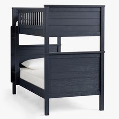 a black bunk bed with white sheets and pillows on top of it, against a white background