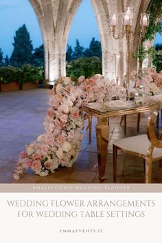 a table with flowers and candles on it in front of an archway that reads, wedding flower arrangements for wedding table settings