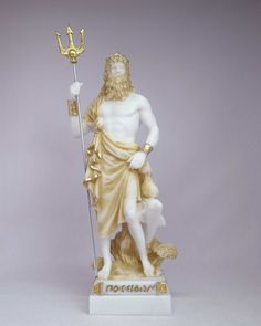 a statue of the greek god pose with his staff