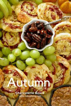 the cover of autumn, with grapes and other food items on it's side