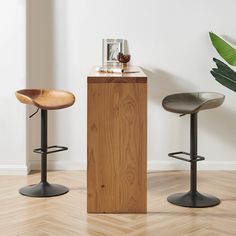 two stools and a table in a room