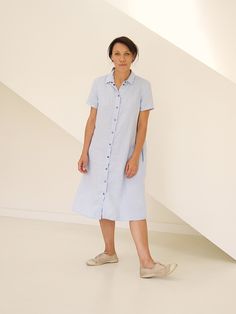 "Shirtdress with short sleeves. We took a classic snap-front silhouette and turned it into an ultra-flattering, lightweight shirtdress that can be worn from work to weekend. The dress has a classic shirt color, short sleeves and belt which makes it perfect as a work outfit for summer. But style it with sneakers or tank top and shorts underneath and you will have a fun and stylish casual look. Shirtdresses give lots of room for outfit experiments! ABOUT US LINEN ID was born from desire to embrace Classic Summer A-line Shirt Dress, Summer Daywear Dresses With Collared Neckline, Classic Linen Midi Shirt Dress, Classic Linen Dress For Spring Daywear, Classic Linen Shirt Dress For Daywear, Elegant Relaxed Fit Short Sleeve Linen Dress, Classic Linen Shirt Dress With Placket, Elegant Short Sleeve Linen Dress With Relaxed Fit, Classic Summer Shirt Dress With Spread Collar