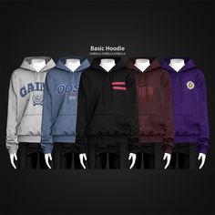 four different colored hoodies on mannequins in front of a black background