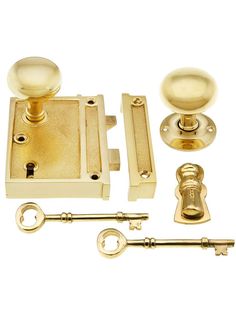 an assortment of brass door knobs and handles with keyed alike locks on white background