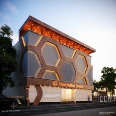 the building is designed to look like hexagonals and has lights on it