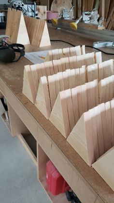 several pieces of wood sitting on top of a table