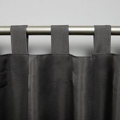 Block intense sunlight on a hot, sunny day with our Charcoal Cabana Outdoor Curtain Panel Set. The Velcro tabs allow for easy set up and removal in any space! Set includes two (2) curtain panels Each curtain panel measures 54L x 108H in. Crafted of water repellent and mildew resistant fabric Charcoal gray hues Heavy-duty, canvas-like feel Each panel features Velcro tab on top Inside diameter for curtain rod measures 1-5/8 in. Each panel sewn with 4 in. heading; 3 in. bottom hem. Safe for outdoor use Care: Spot clean and or hand wash in cold water only. Iron on low heat as needed. This item is available at Kirklands.com only, not available in stores. Please note: this item cannot be shipped to APO/FPO addresses. | Cabana Outdoor Curtain Panel Set, 108 in., Black/Gray, , Canvas | Kirkland's Light Blocking Curtains, Tab Top Curtains, Curtain Room, Exclusive Home, Home Curtains, Outdoor Curtains, Grommet Curtains, Curtain Panels, Curtain Rod