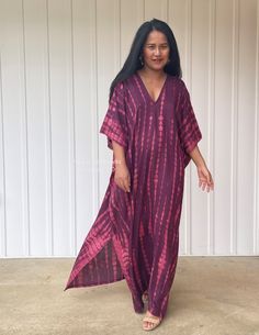 "DETAILS * Oversized * Bust/Waist/Hips 37\" wide, circumference 72\" * Approx. 50\" & 52\" long from shoulder to hem * V neckline both front & rear * Loose silhouette * Side slits * Slipover style * Rayon fabric with hand tie dye * Gentle machine wash with low heat dry, first wash separately * Model tall 5'4\"/164 cm. wearing 55\" L. * Style CM" Festival Batik Print V-neck Maxi Dress, Festival V-neck Maxi Dress With Batik Print, Festival Tie Dye Maxi Length Kaftan, Long Tie-dye Dress For Beach Cover-up, Festival Tie-dye Maxi Kaftan, Free Size Purple Maxi Kaftan, Purple Short Sleeve Kaftan For Summer, Bohemian Tie-dye V-neck Kaftan, Bohemian Tie Dye V-neck Kaftan