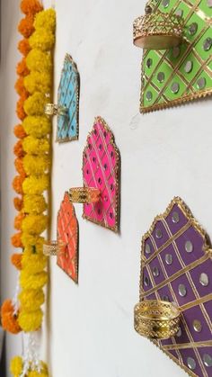 the wall is decorated with colorful decorations