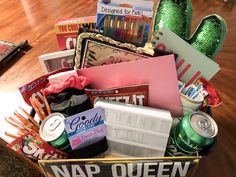 a basket filled with assorted items on top of a wooden table