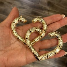 10k Yellow Gold Large Bamboo Heart Earrings 2.5” Inches 9mm Thickness Approximately 13 Grams Comes In A Beautiful Jewelry Box. Heart Bamboo Earrings, African Inspired Clothing, Bamboo Earrings, African Inspired, Beautiful Blouses, Cute Earrings, Heart Earrings, Wardrobe Essentials, Beautiful Jewelry