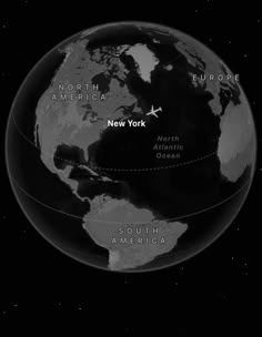 a black and white photo of the earth with two lines in each direction that point to new york, north america