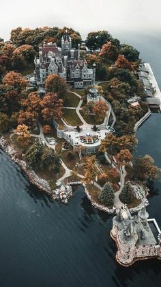 an island with many trees and houses on it