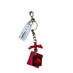 a keychain with a card holder attached to it's front and back ends