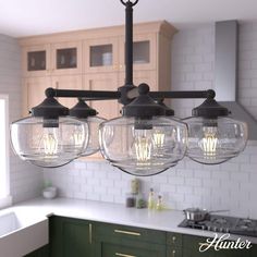 an image of a kitchen with lights hanging from it's ceiling and cabinets in the background