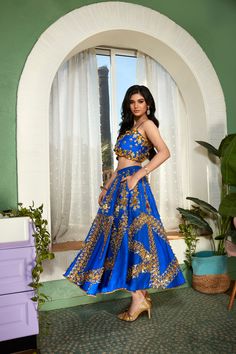 This electric blue colored panelled half lehenga is a work of art, embellished with glass stones, metal pieces, and glass cut beads. The intricate embroidery creates a beautiful shimmering effect that catches the light and sparkles all night long. Night Bling is paired with an original Papa Don't Preach blue blouse, embellished with 3D embroidery.From Papa Don’t Preach’s Capsule collection. DELIVERY TIMEPlease allow 8-12 weeks for your outfit to arrive. FABRIC DETAILSRawsilk Professional cleanin Half Lehenga, Long Night, 3d Embroidery, Change Image, 12 Weeks, Intricate Embroidery, Custom Tailoring, Capsule Collection, Raw Silk