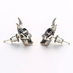 "Skull Earrings, Skull Mask Stud Earrings, Japanese Oni Mask Earrings, Devil Earrings, Sterling Silver Earrings - Made of 925 sterling silver; - Embellished with Red Cubic Zirconia stones; - 925 hallmark on the back; - Earrings size is 0.43\" x 0.59\" (11 mm x 15 mm); - Suitable for men and women alike; - Made by hand." Skull Shaped Metal Earrings For Gifts, Silver Skull Earrings For Pierced Ears, Skull-shaped Metal Earrings With Ear Wire, Metal Skull Earrings With Ear Wire, Silver Skull Earrings With Ear Wire, Silver Skull Earrings, Japanese Oni Mask, Mens Sapphire Ring, Earrings Japanese