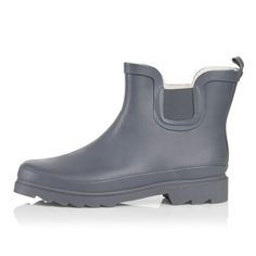 NORTY Womens Ankle High Rain Boots. Adult Ladies Waterproof Winter Spring Garden Boot. No matter how wet, muddy, or slick it gets outside, our adult rain boots for women have you covered. An ankle-cut and fun, feminine styling keeps you warm, dry, and outfitted in fresh fall and winter-ready looks. This extra-roomy insulated rubber boot lets you layer on your favorite thick socks on the colder days, and a rugged rubber tread sole makes sure you don't slip and slide. Whether you're using them as Gray Rain Boots, High Rain Boots, Rain Boots For Women, Garden Boots, Chelsea Rain Boots, Boots Waterproof, Rubber Boot, Slip And Slide, Thick Socks