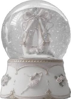 a snow globe with an angel on it