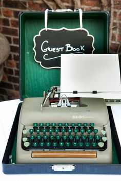 an old fashioned typewriter sitting in a case