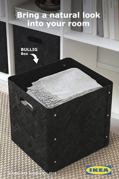 a black box with a white towel in it and the words bring a natural look into your room